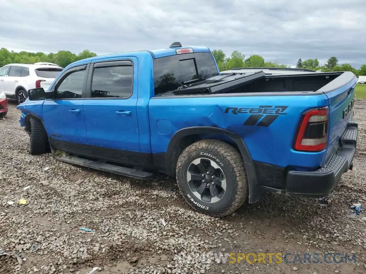 2 fotografías del automóvil dañado 1C6SRFLT9MN603035 RAM 1500 2021