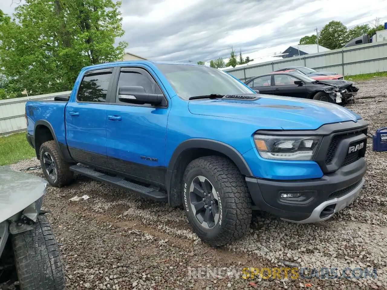 4 fotografías del automóvil dañado 1C6SRFLT9MN603035 RAM 1500 2021