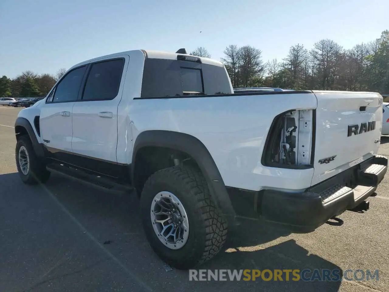 2 fotografías del automóvil dañado 1C6SRFU90MN705701 RAM 1500 2021