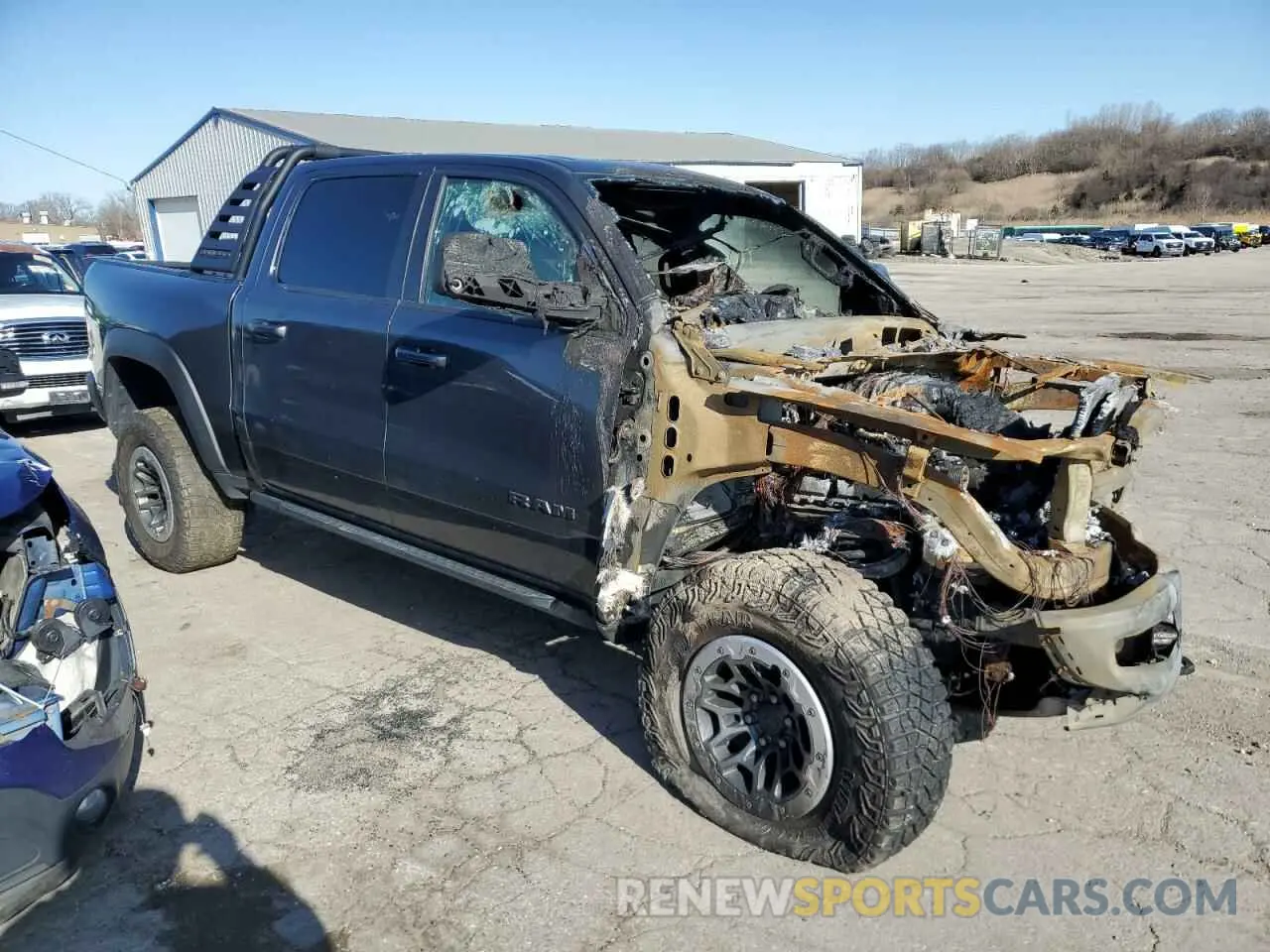 4 fotografías del automóvil dañado 1C6SRFU94MN684724 RAM 1500 2021