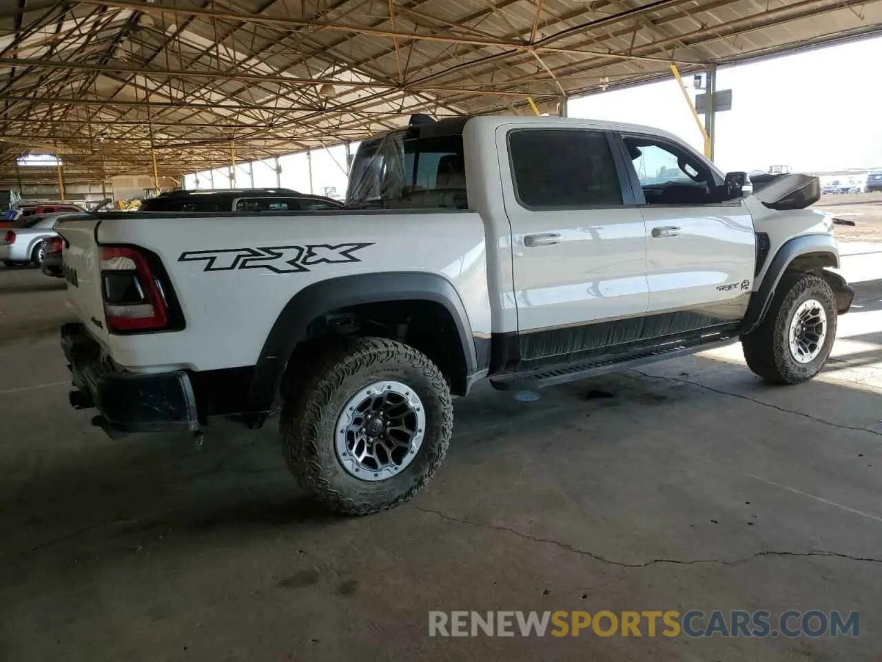 3 fotografías del automóvil dañado 1C6SRFU94MN764282 RAM 1500 2021