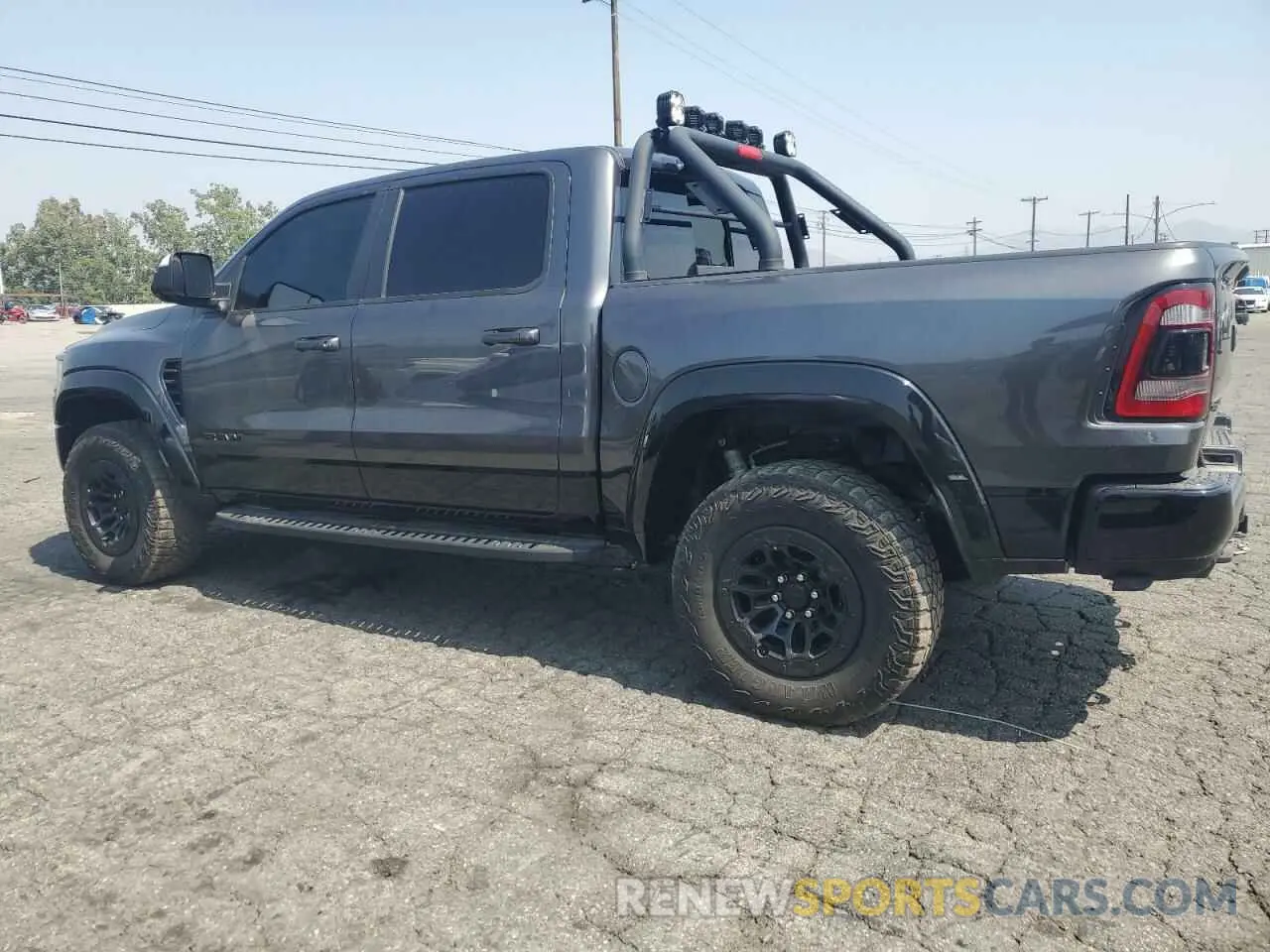 2 fotografías del automóvil dañado 1C6SRFU97MN906236 RAM 1500 2021