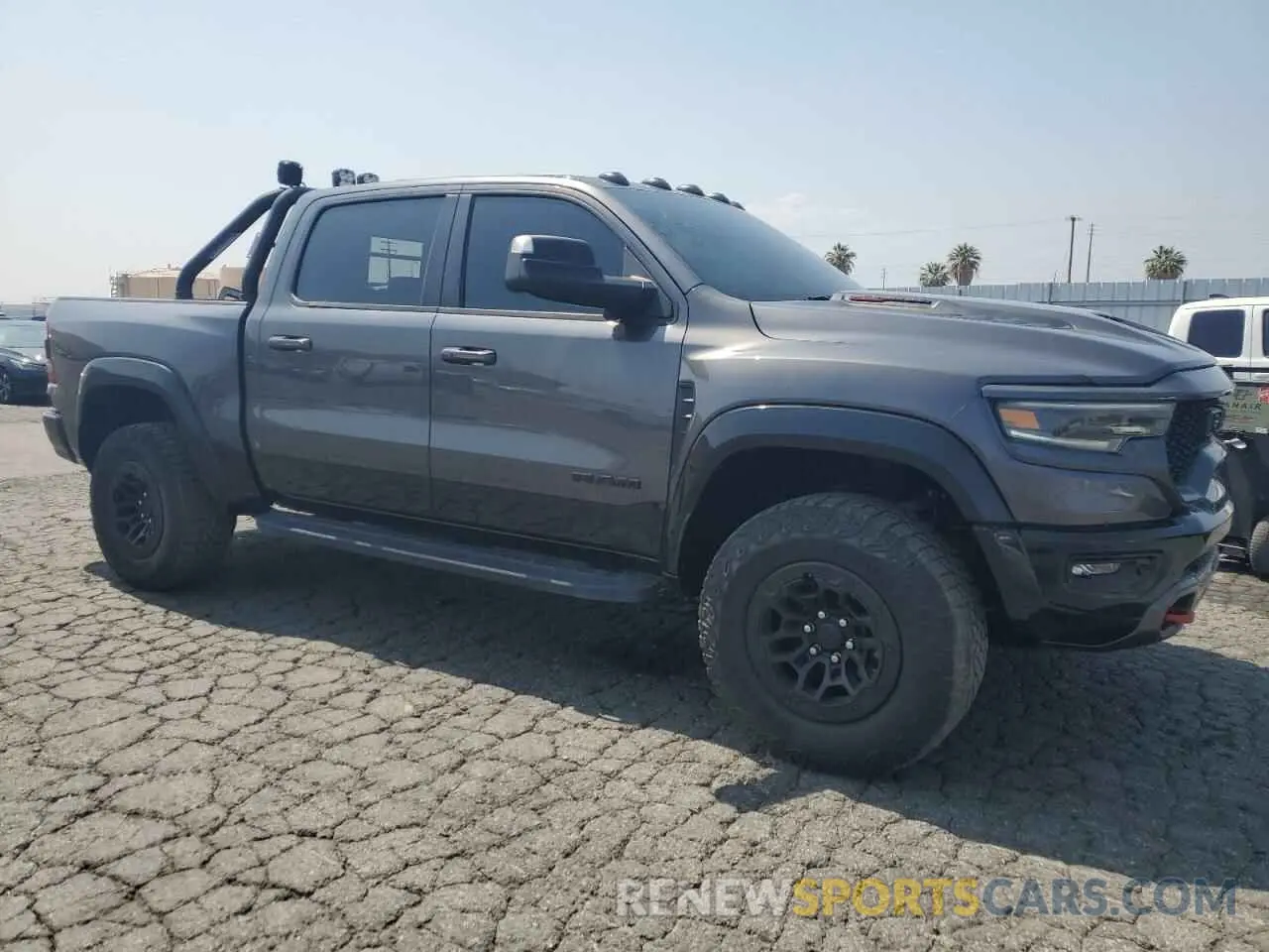 4 fotografías del automóvil dañado 1C6SRFU97MN906236 RAM 1500 2021