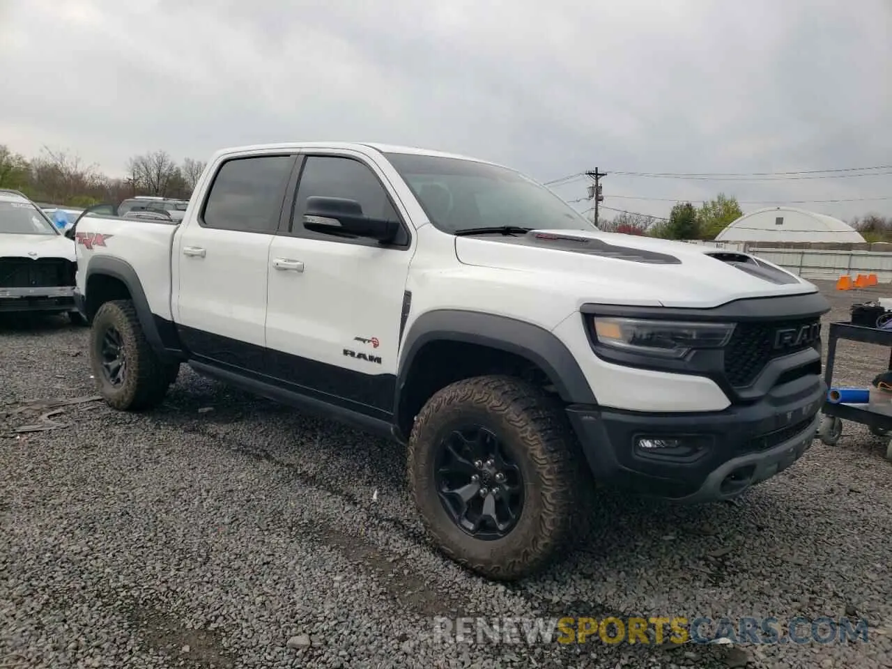 4 fotografías del automóvil dañado 1C6SRFU98MN764513 RAM 1500 2021