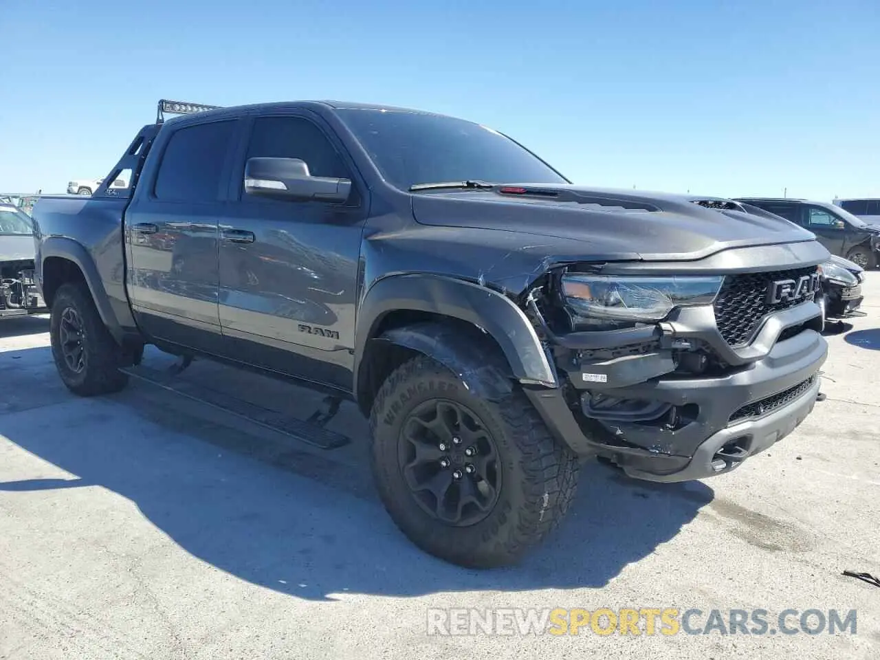 4 fotografías del automóvil dañado 1C6SRFU99MN744688 RAM 1500 2021