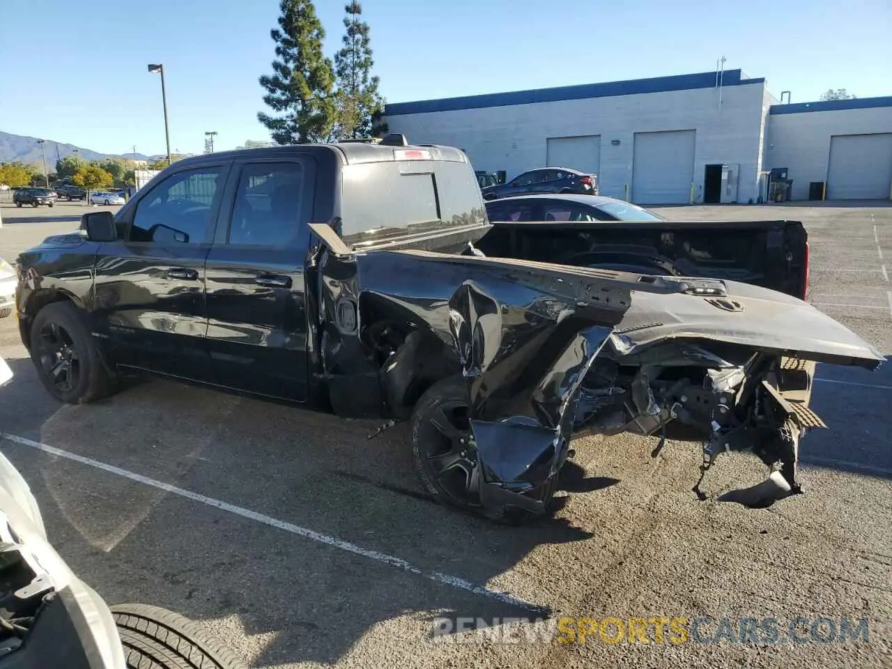 2 fotografías del automóvil dañado 1C6RREBT1NN276027 RAM 1500 2022