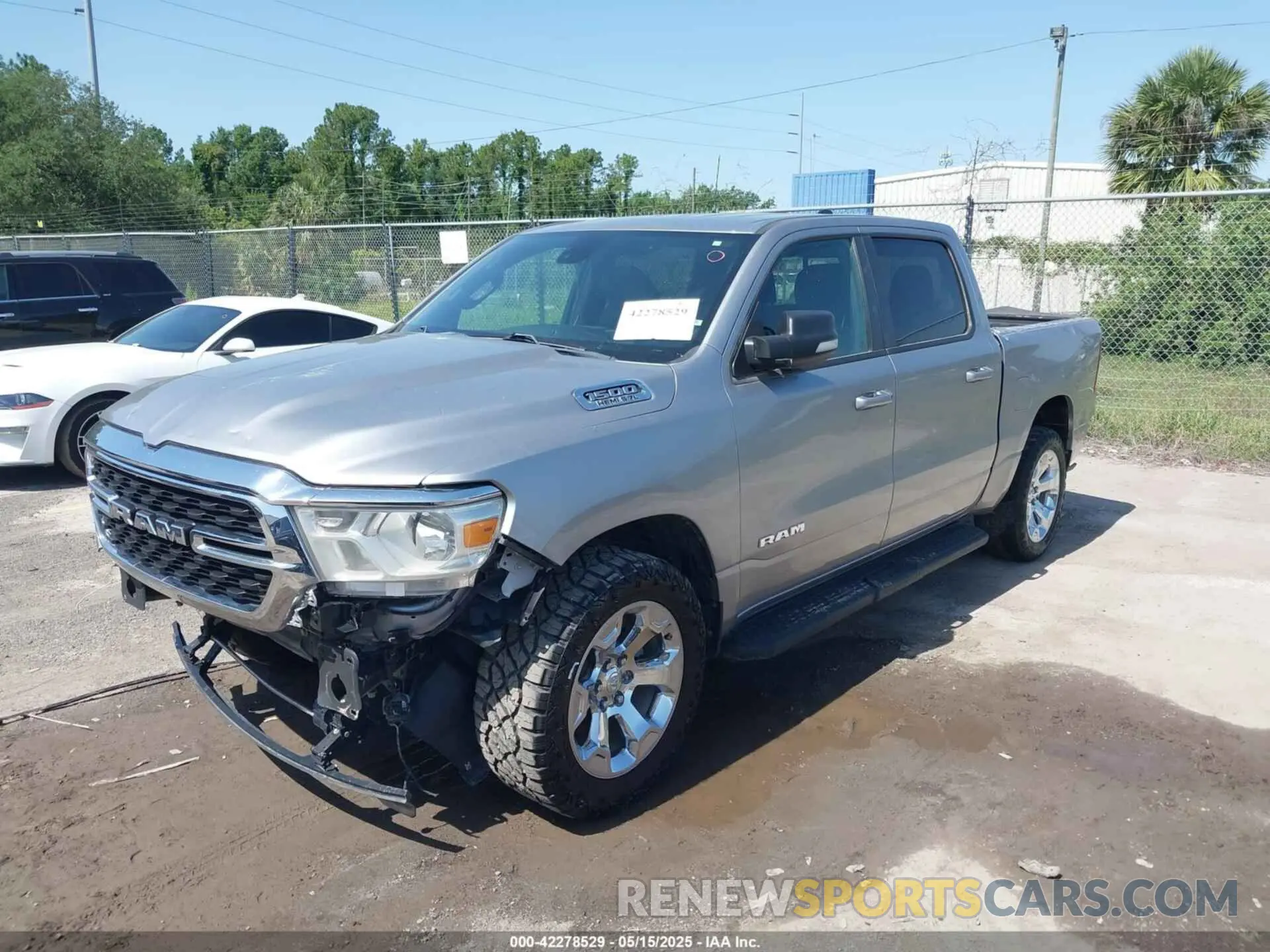 2 fotografías del automóvil dañado 1C6RREFTXNN254344 RAM 1500 2022