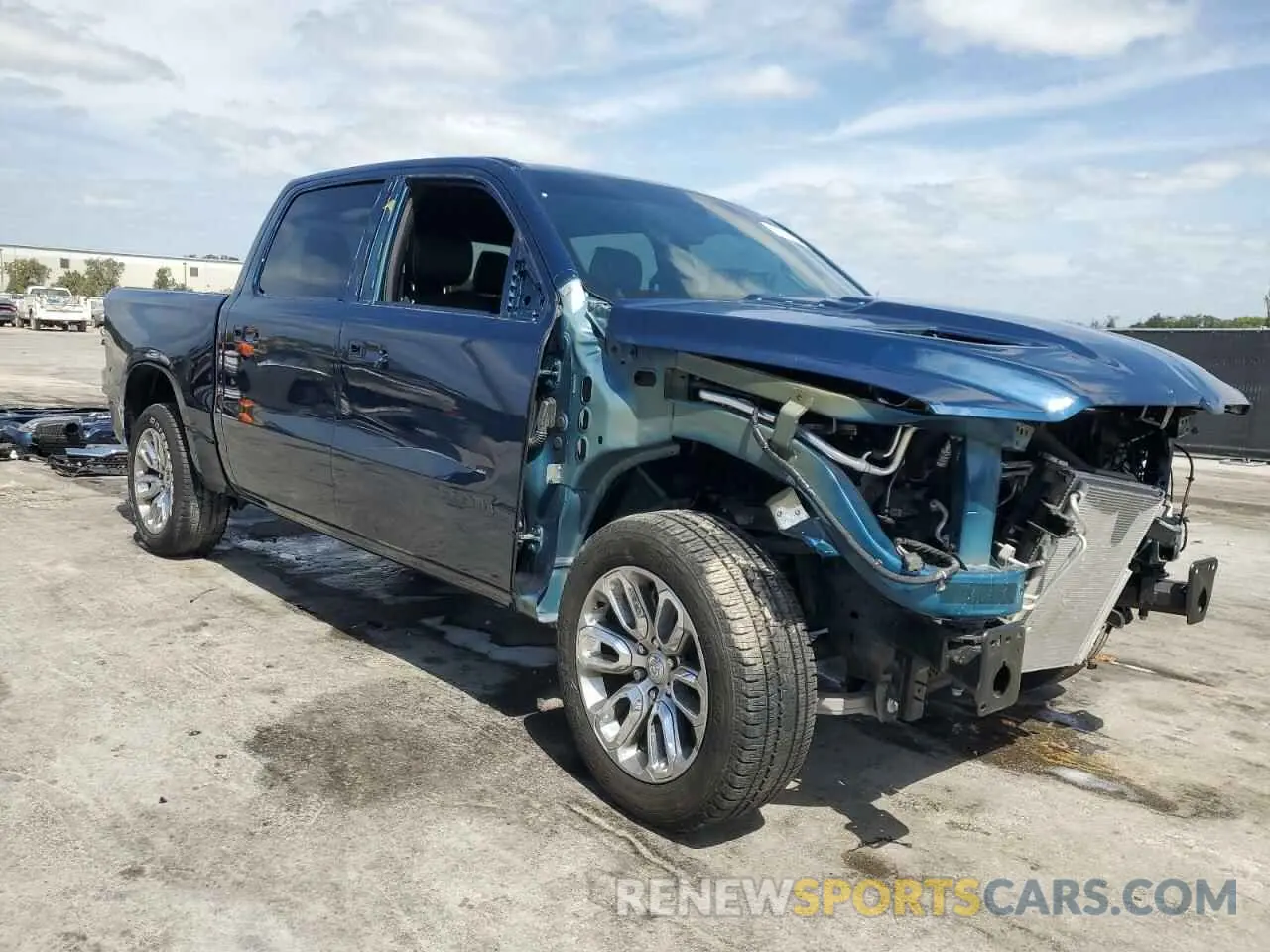 4 fotografías del automóvil dañado 1C6RREJT0NN291572 RAM 1500 2022
