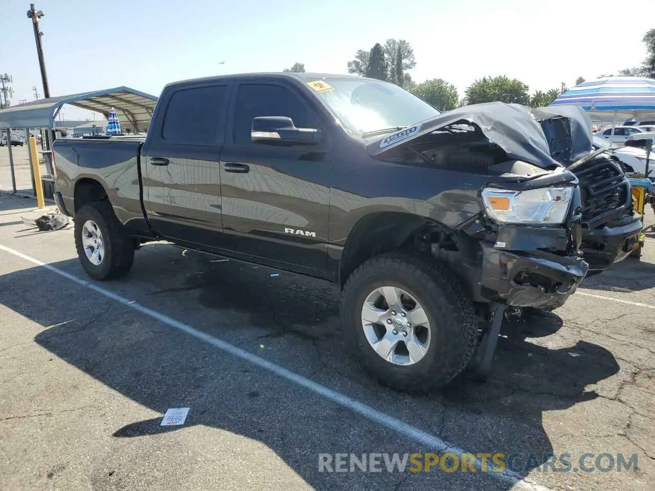 4 fotografías del automóvil dañado 1C6RRFMG7NN441178 RAM 1500 2022