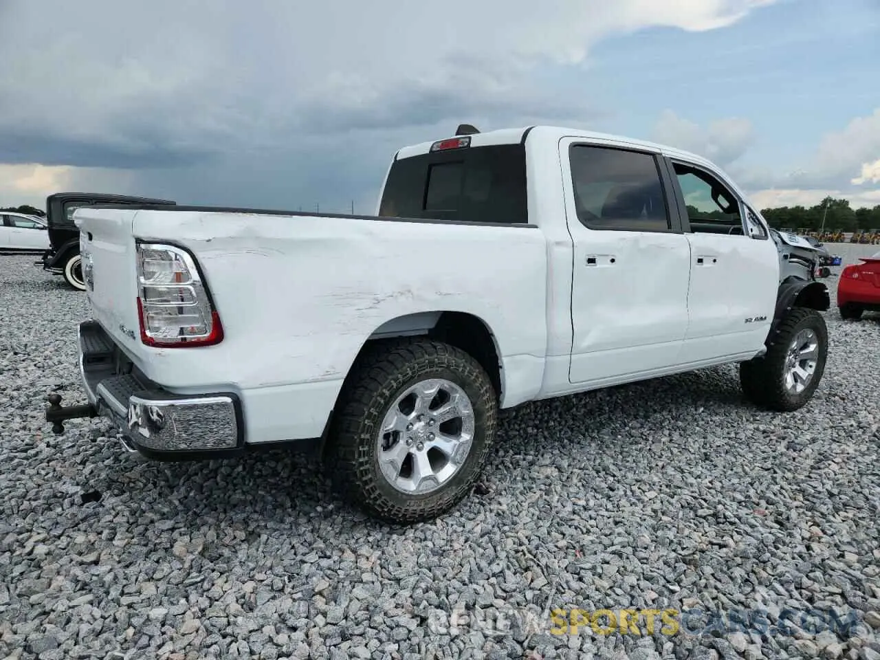 3 fotografías del automóvil dañado 1C6SRFFT9NN404662 RAM 1500 2022