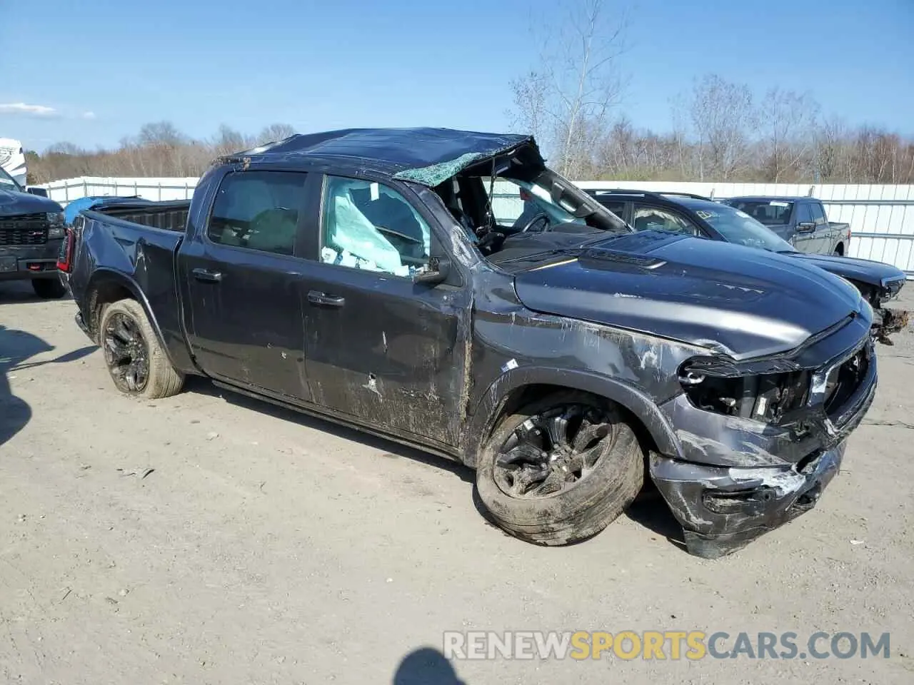 4 fotografías del automóvil dañado 1C6SRFHT0NN281976 RAM 1500 2022