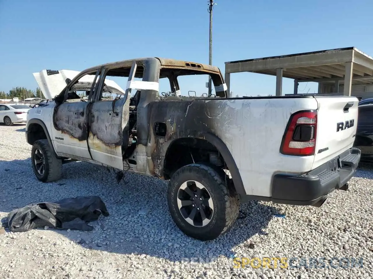 2 fotografías del automóvil dañado 1C6SRFLT1NN188911 RAM 1500 2022
