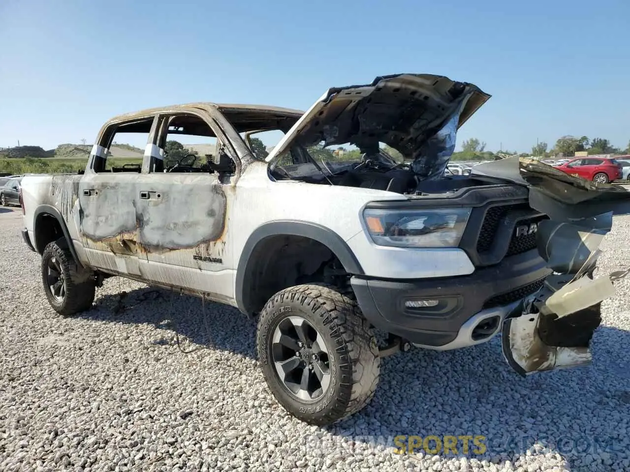 4 fotografías del automóvil dañado 1C6SRFLT1NN188911 RAM 1500 2022