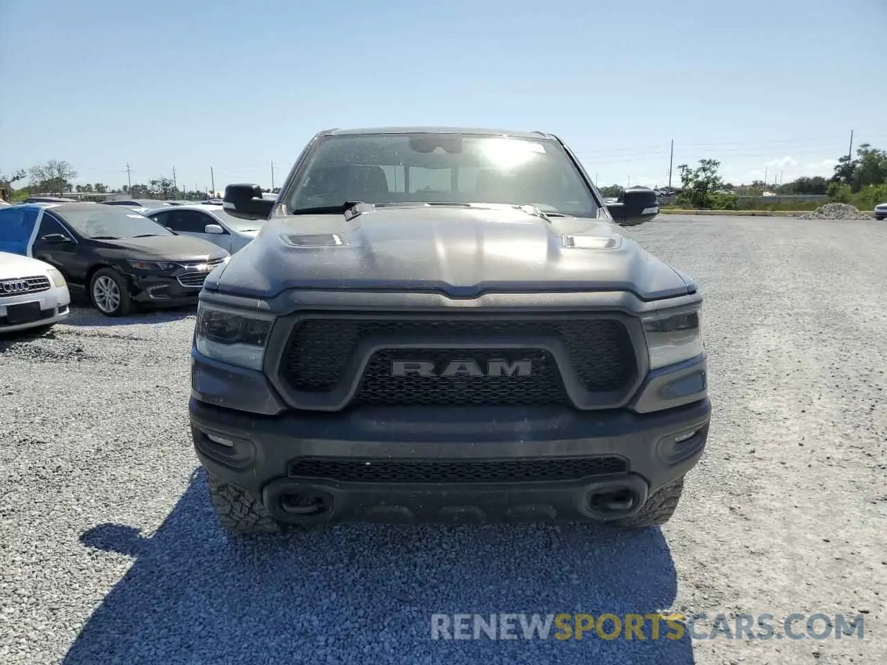 5 fotografías del automóvil dañado 1C6SRFLT1NN322669 RAM 1500 2022