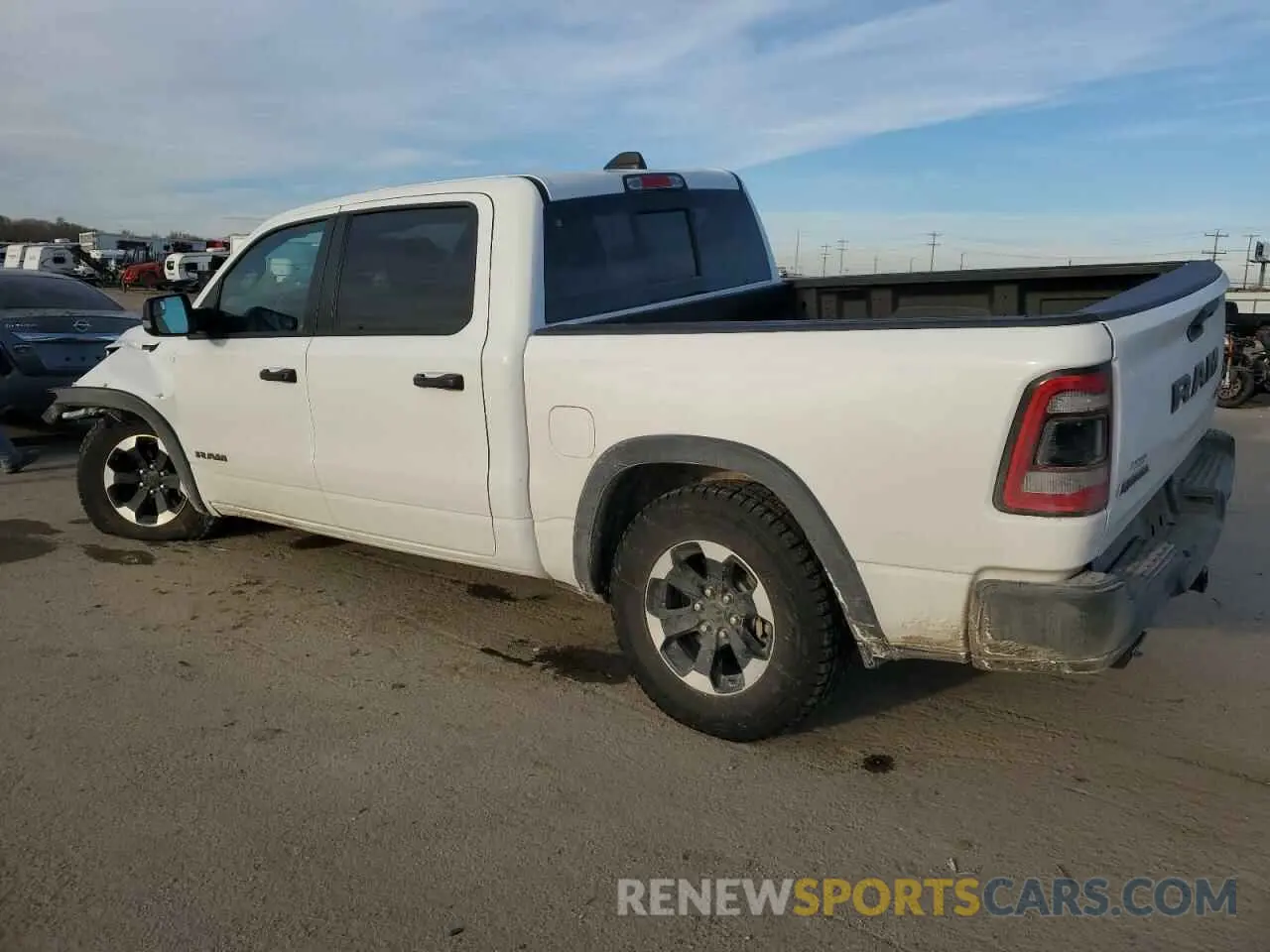 2 fotografías del automóvil dañado 1C6SRFLT7NN379880 RAM 1500 2022
