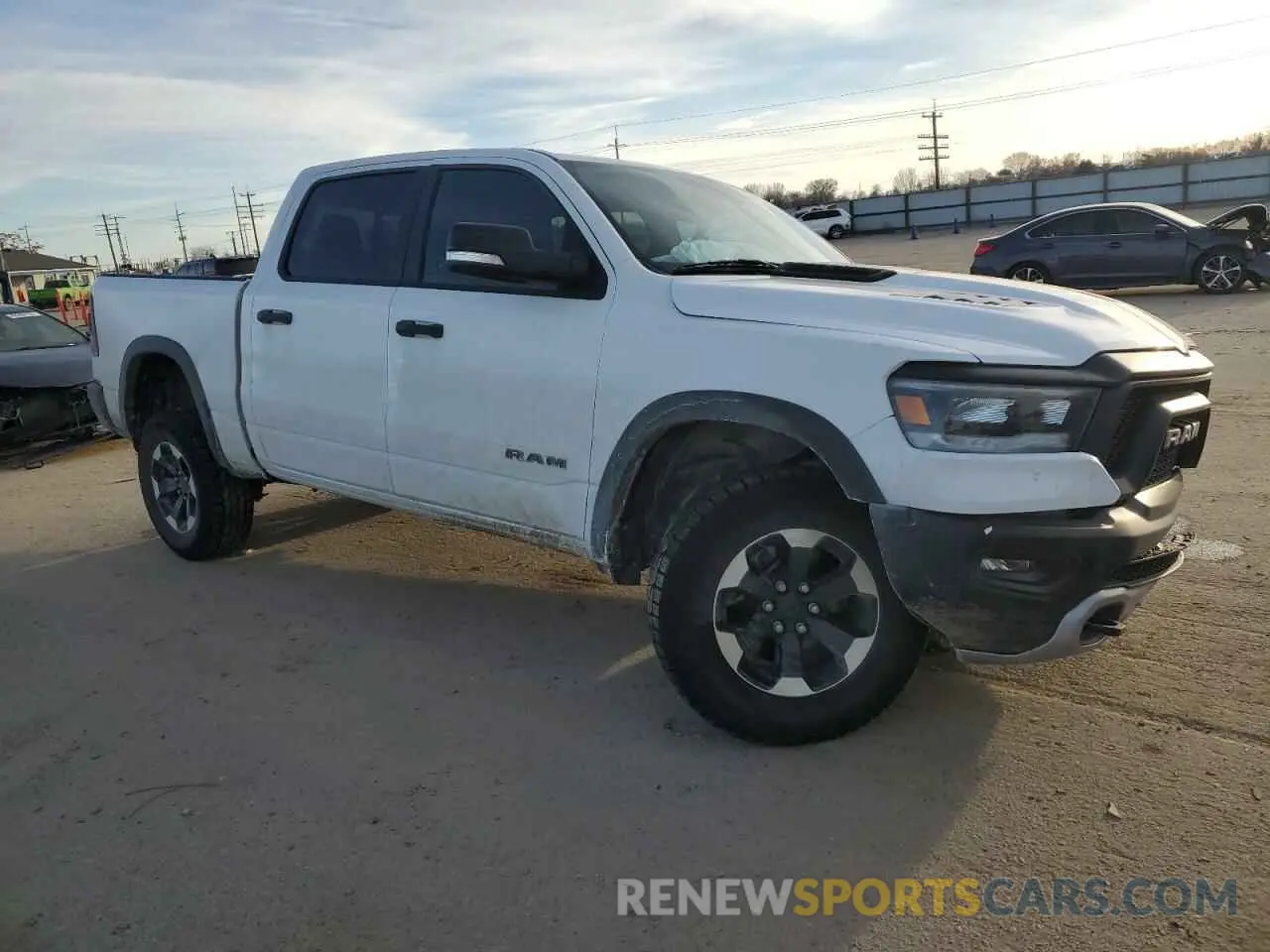 4 fotografías del automóvil dañado 1C6SRFLT7NN379880 RAM 1500 2022