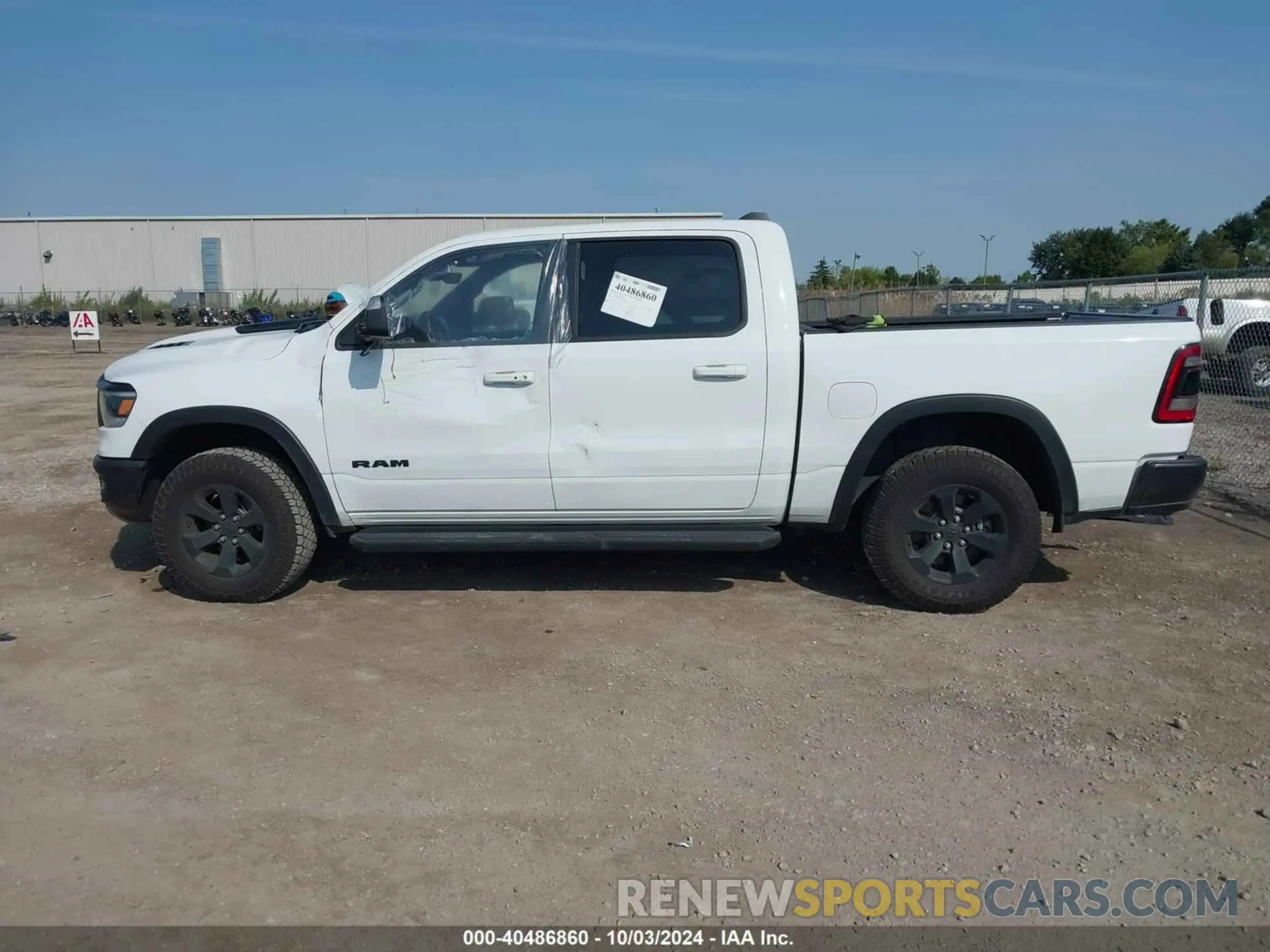 14 fotografías del automóvil dañado 1C6SRFLTXNN338532 RAM 1500 2022