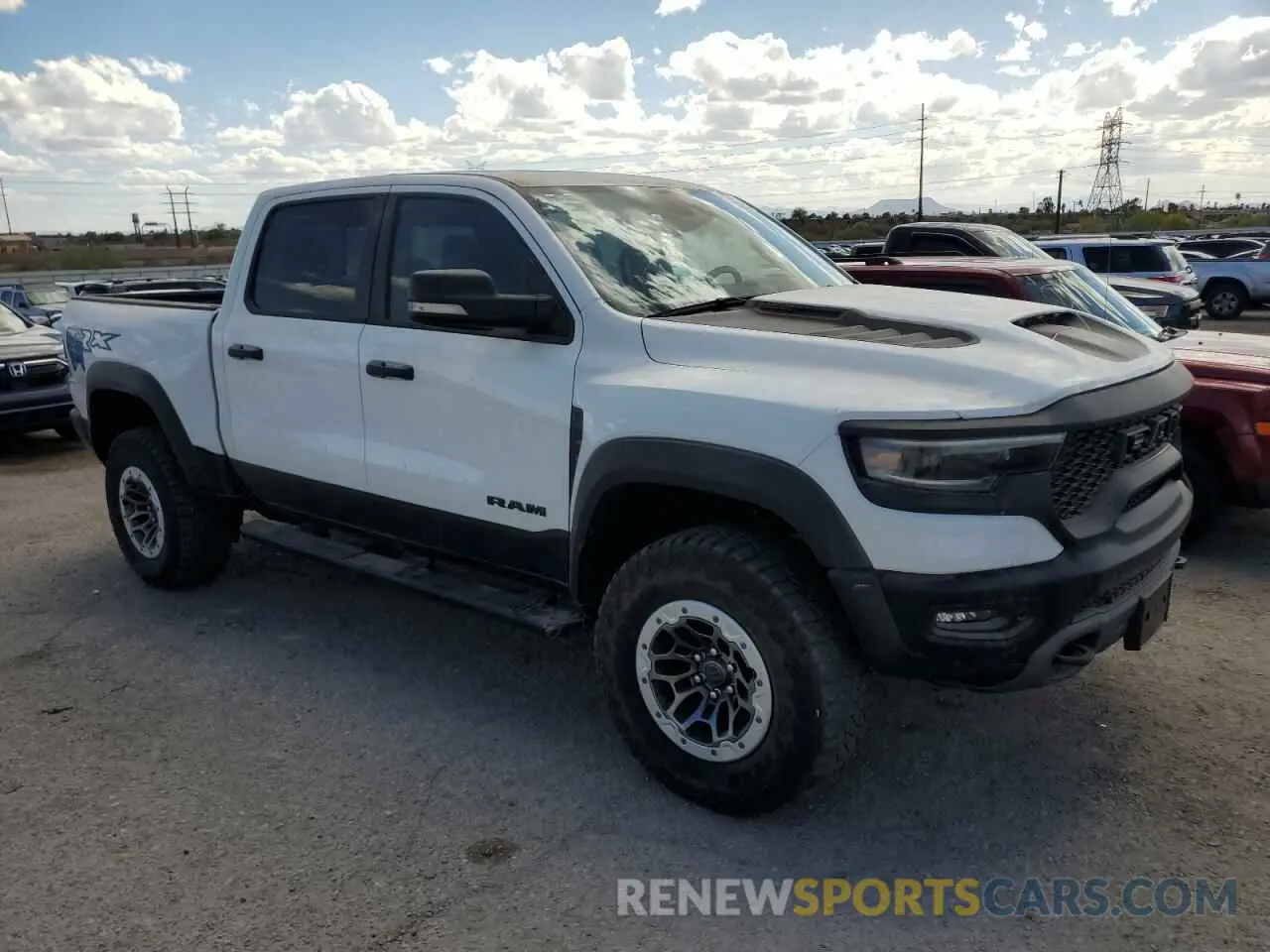 4 fotografías del automóvil dañado 1C6SRFU96NN193489 RAM 1500 2022