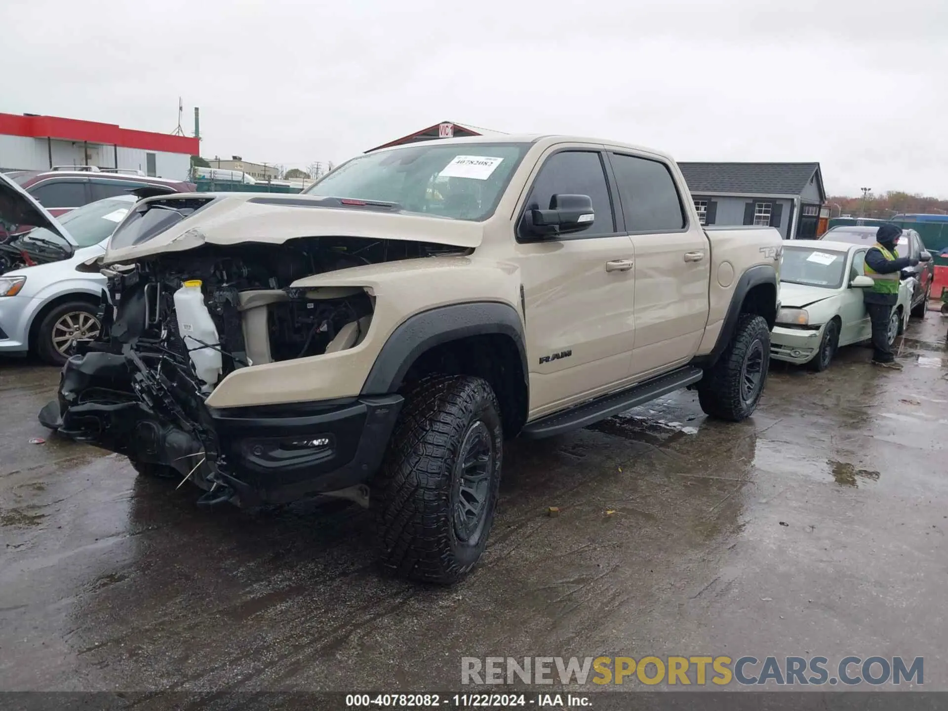 2 fotografías del automóvil dañado 1C6SRFU96NN404111 RAM 1500 2022