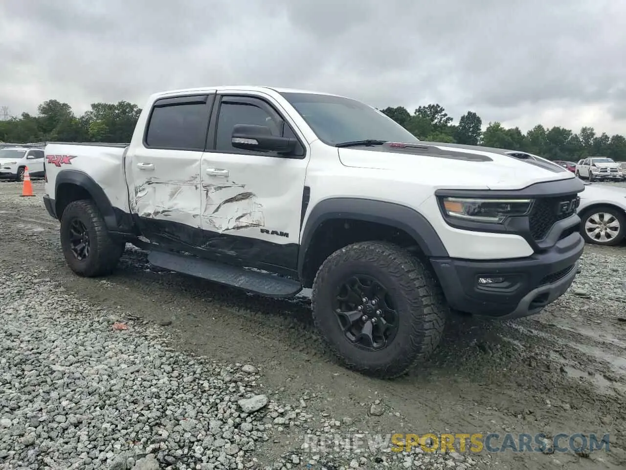 4 fotografías del automóvil dañado 1C6SRFU99NN318694 RAM 1500 2022