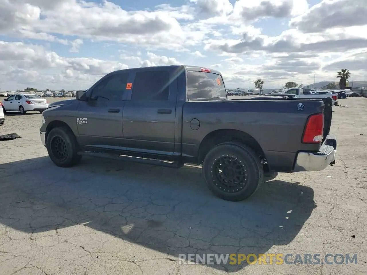 2 fotografías del automóvil dañado 3C6RR7KG1NG310684 RAM 1500 2022