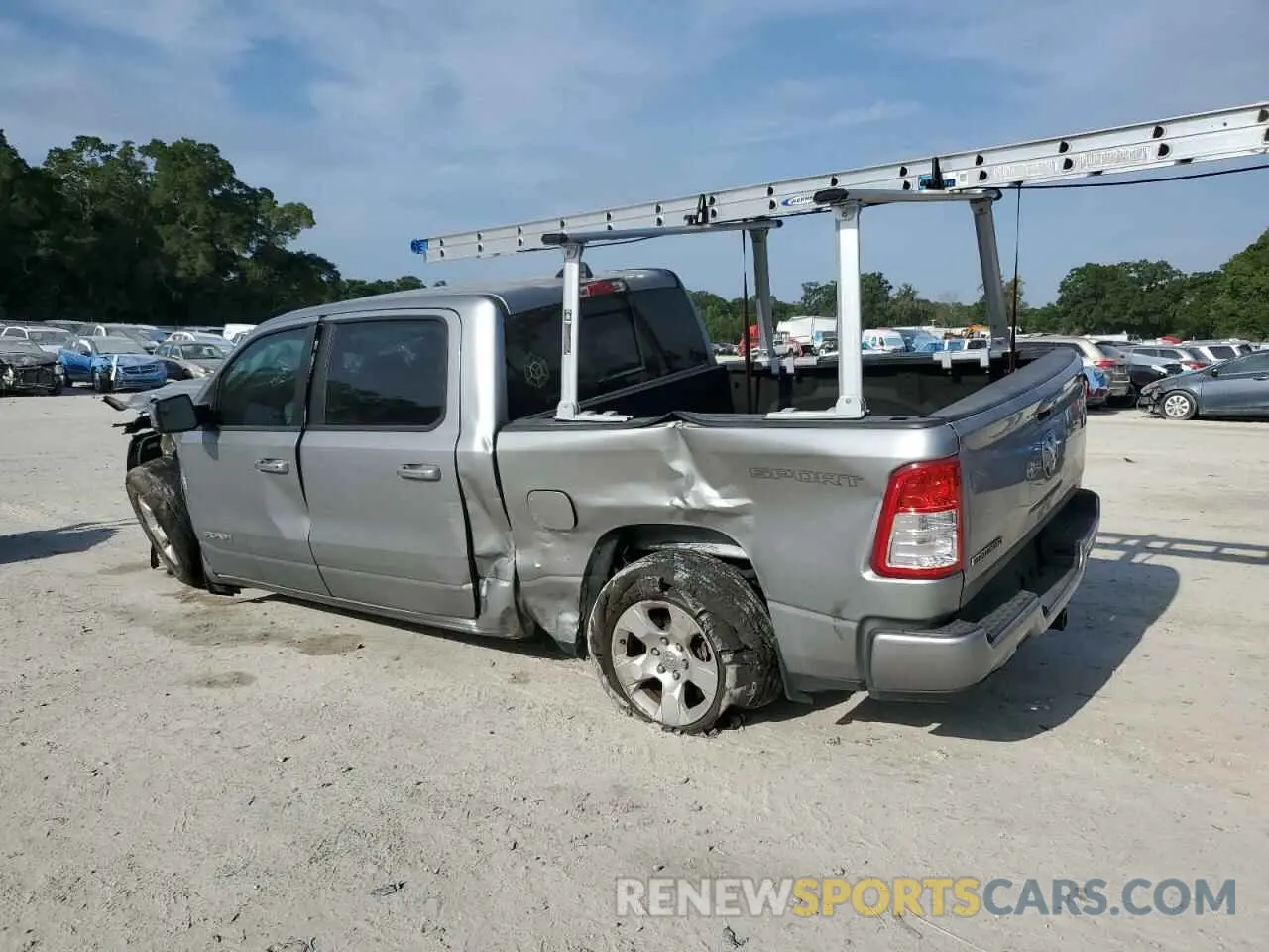 2 fotografías del automóvil dañado 1C6RREFT5PN579311 RAM 1500 2023
