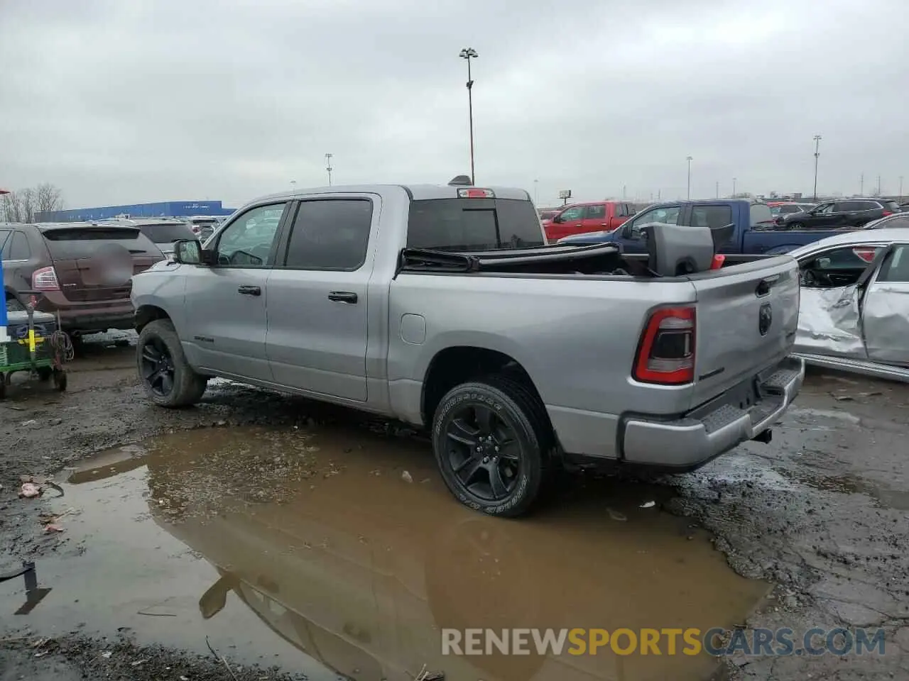 2 fotografías del automóvil dañado 1C6RRFFG1PN590654 RAM 1500 2023