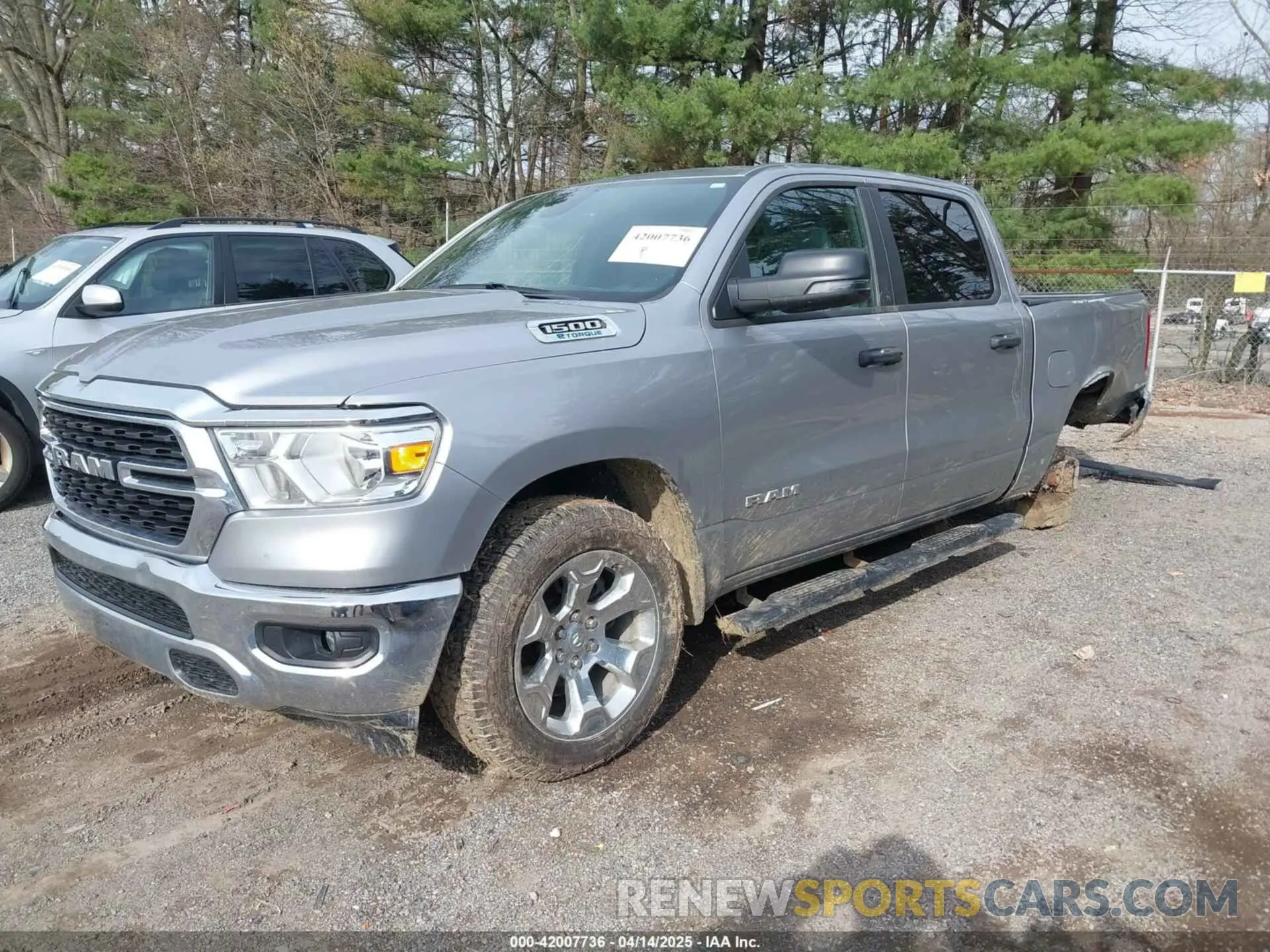 2 fotografías del automóvil dañado 1C6RRFFG3PN690013 RAM 1500 2023