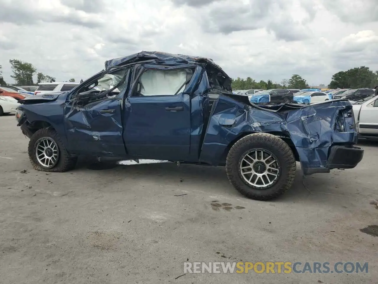 2 fotografías del automóvil dañado 1C6RRFGG0PN683910 RAM 1500 2023