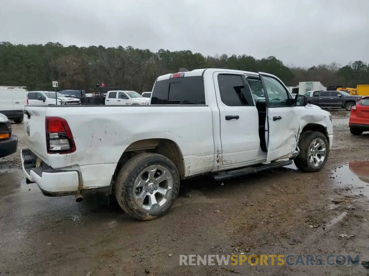 3 fotografías del automóvil dañado 1C6SRECG9PN693711 RAM 1500 2023