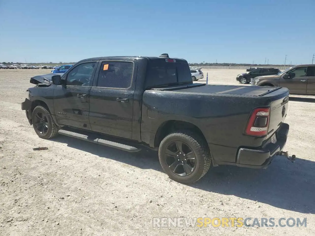 2 fotografías del automóvil dañado 1C6SRFFM2PN563471 RAM 1500 2023