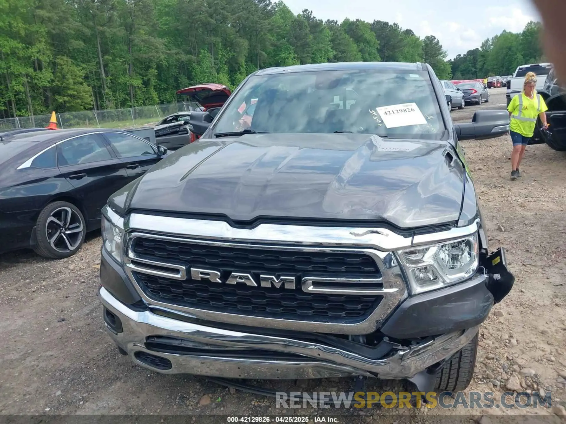 12 fotografías del automóvil dañado 1C6SRFFT0PN609760 RAM 1500 2023