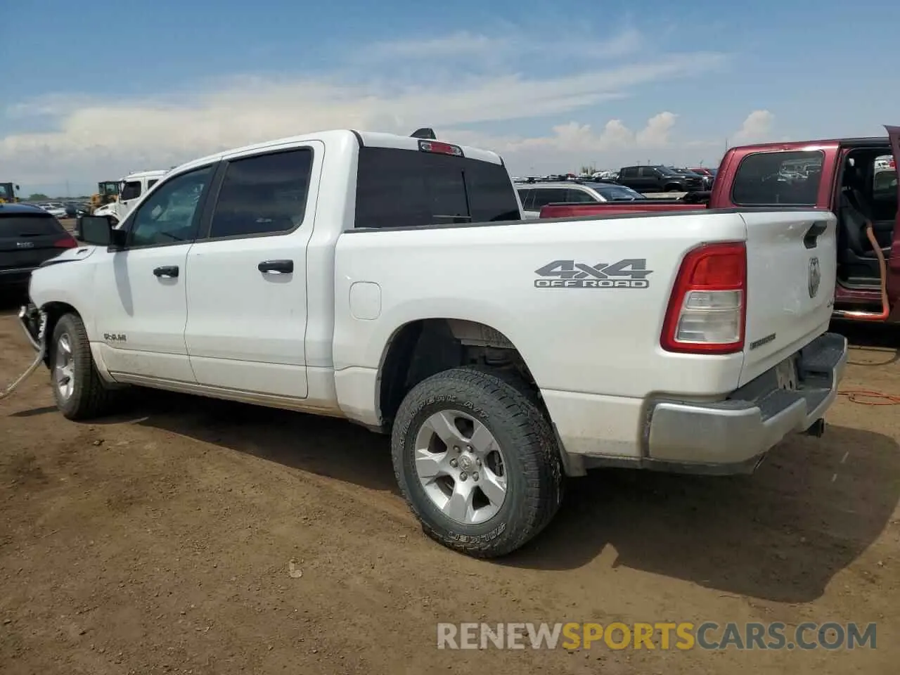 2 fotografías del automóvil dañado 1C6SRFFT0PN616465 RAM 1500 2023