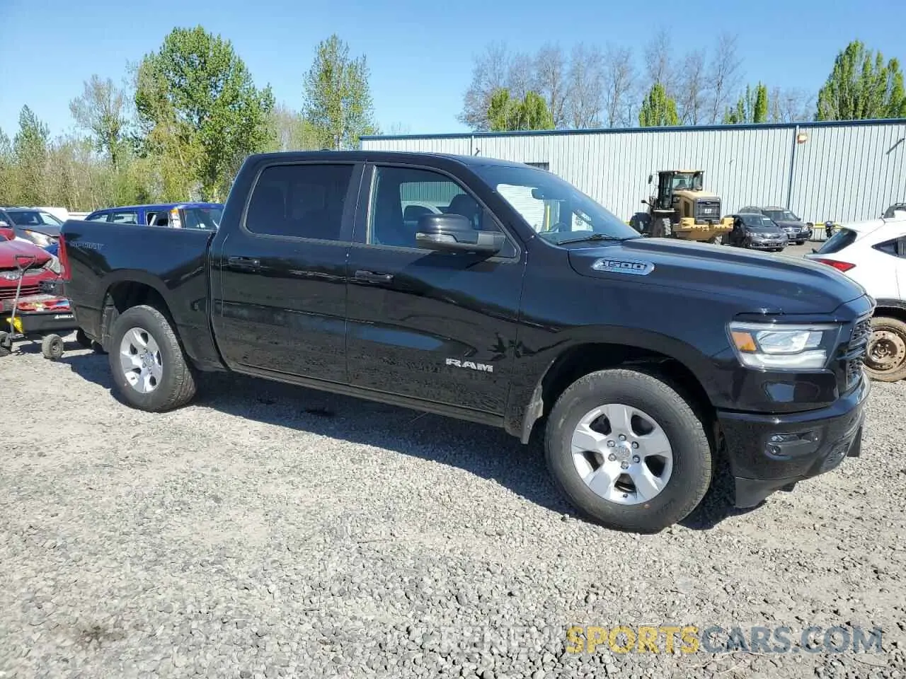 4 fotografías del automóvil dañado 1C6SRFFT7PN602921 RAM 1500 2023