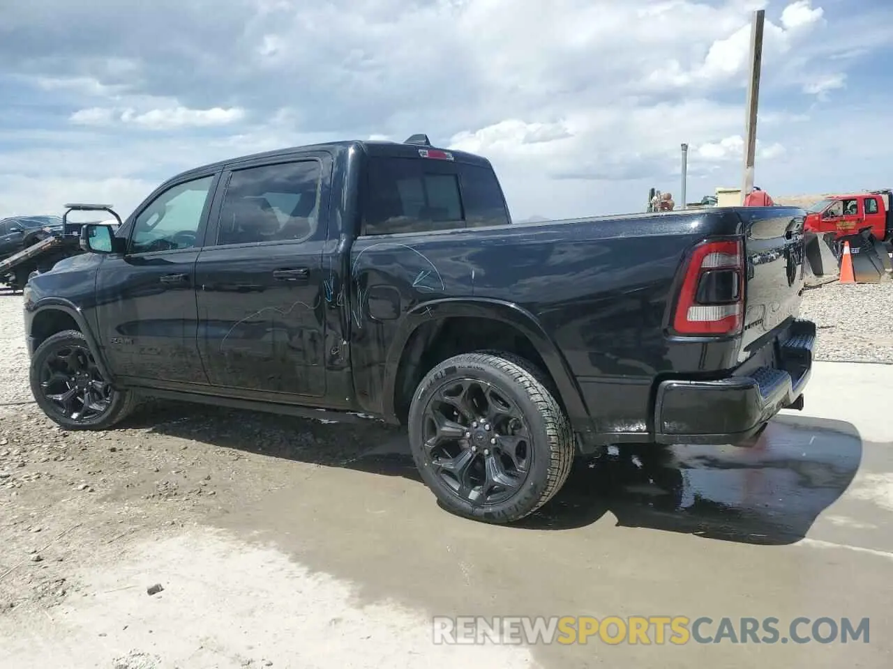 2 fotografías del automóvil dañado 1C6SRFHT5PN541274 RAM 1500 2023