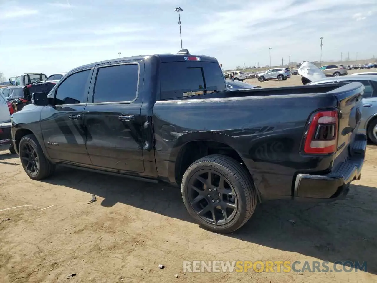 2 fotografías del automóvil dañado 1C6SRFJT4PN619442 RAM 1500 2023