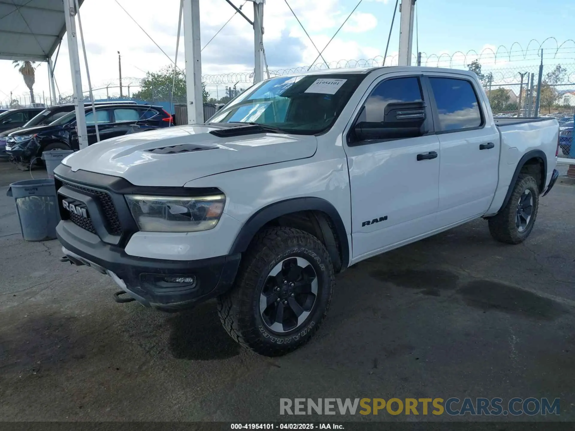 2 fotografías del automóvil dañado 1C6SRFLT5PN588604 RAM 1500 2023