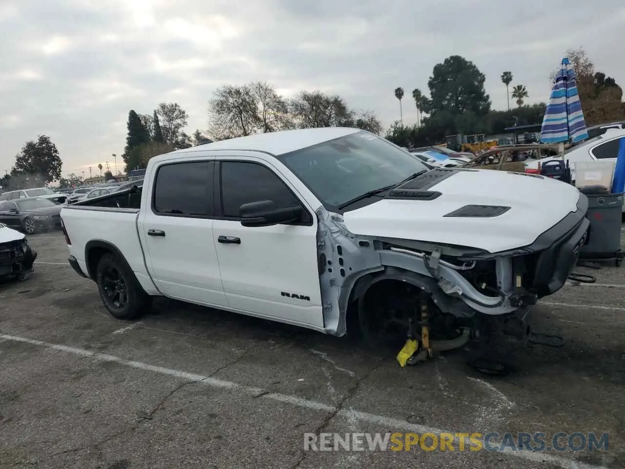 4 fotografías del automóvil dañado 1C6SRFLT6PN629323 RAM 1500 2023