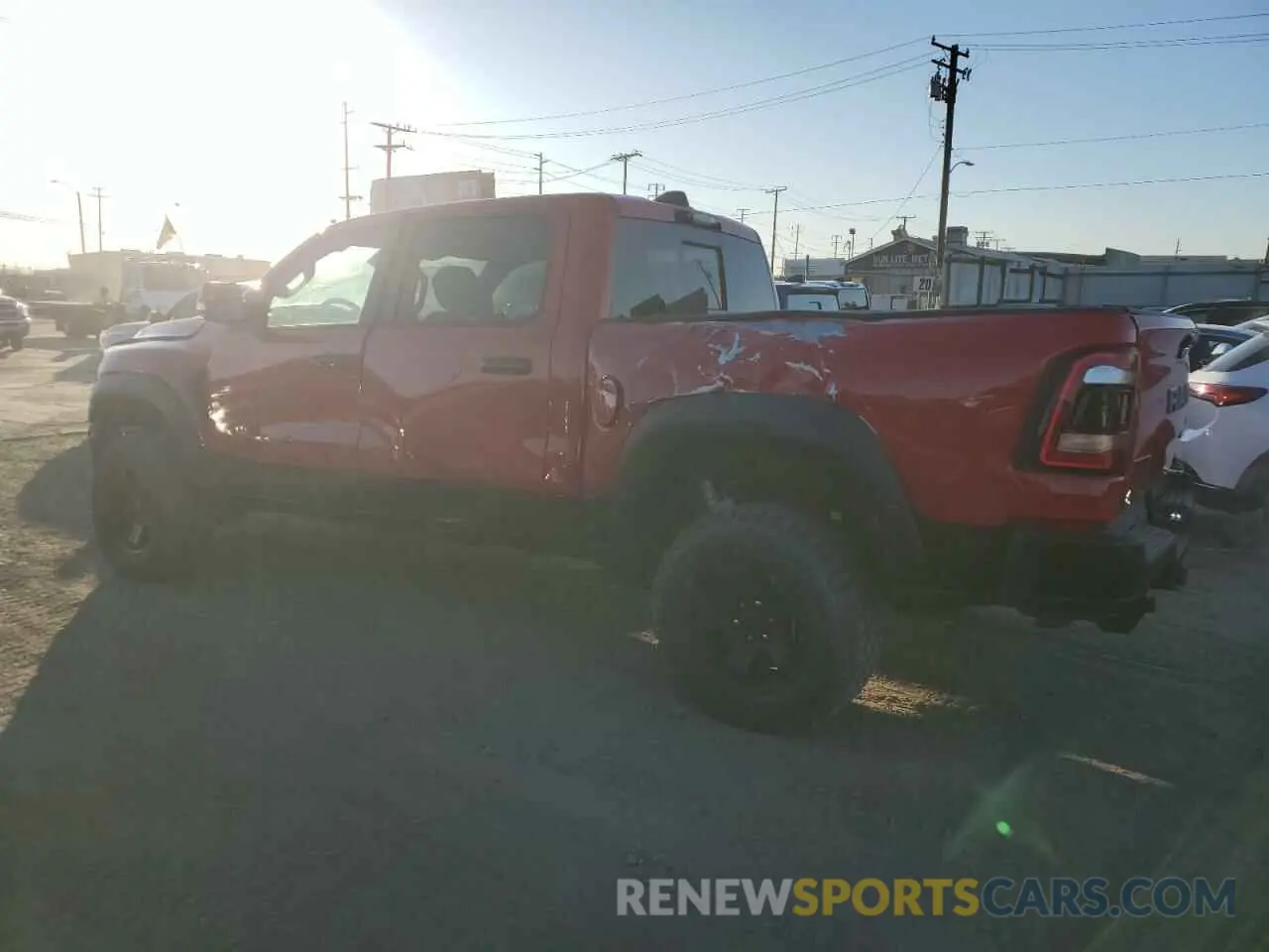 2 fotografías del automóvil dañado 1C6SRFU97PN551380 RAM 1500 2023