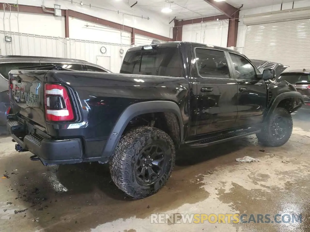 3 fotografías del automóvil dañado 1C6SRFU98PN511499 RAM 1500 2023