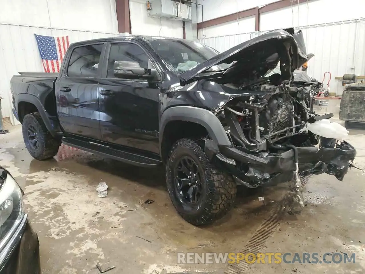 4 fotografías del automóvil dañado 1C6SRFU98PN511499 RAM 1500 2023
