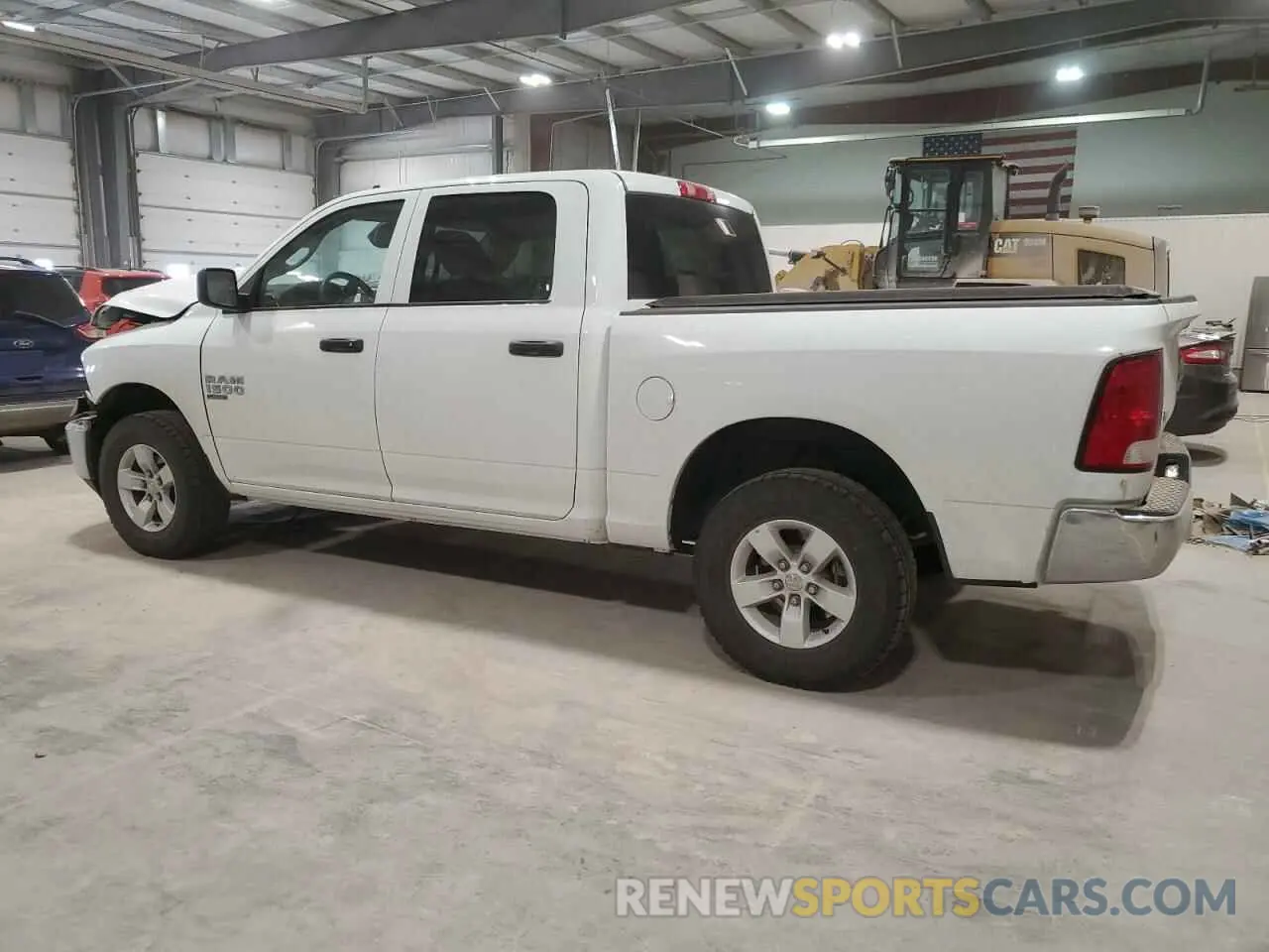2 fotografías del automóvil dañado 3C6RR7LG9PG661425 RAM 1500 2023