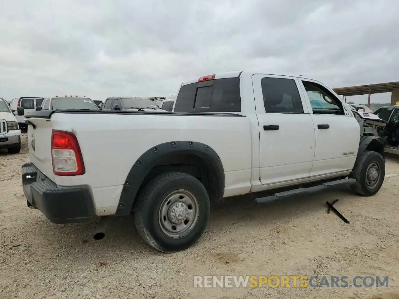 3 fotografías del automóvil dañado 3C6UR4CJ9KG576226 RAM 2500 2019
