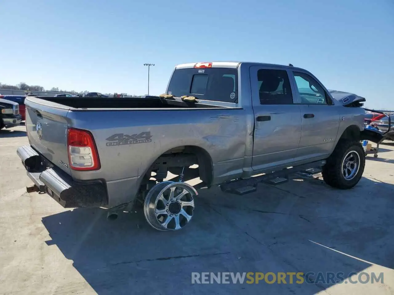 3 fotografías del automóvil dañado 3C6UR5CL5KG705523 RAM 2500 2019