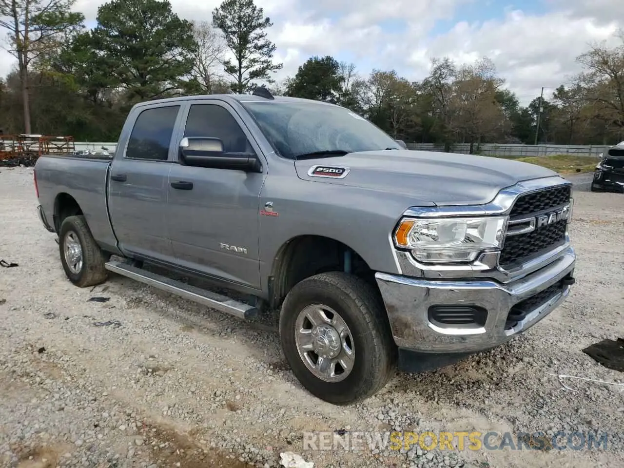 4 fotografías del automóvil dañado 3C6UR5CLXKG666976 RAM 2500 2019
