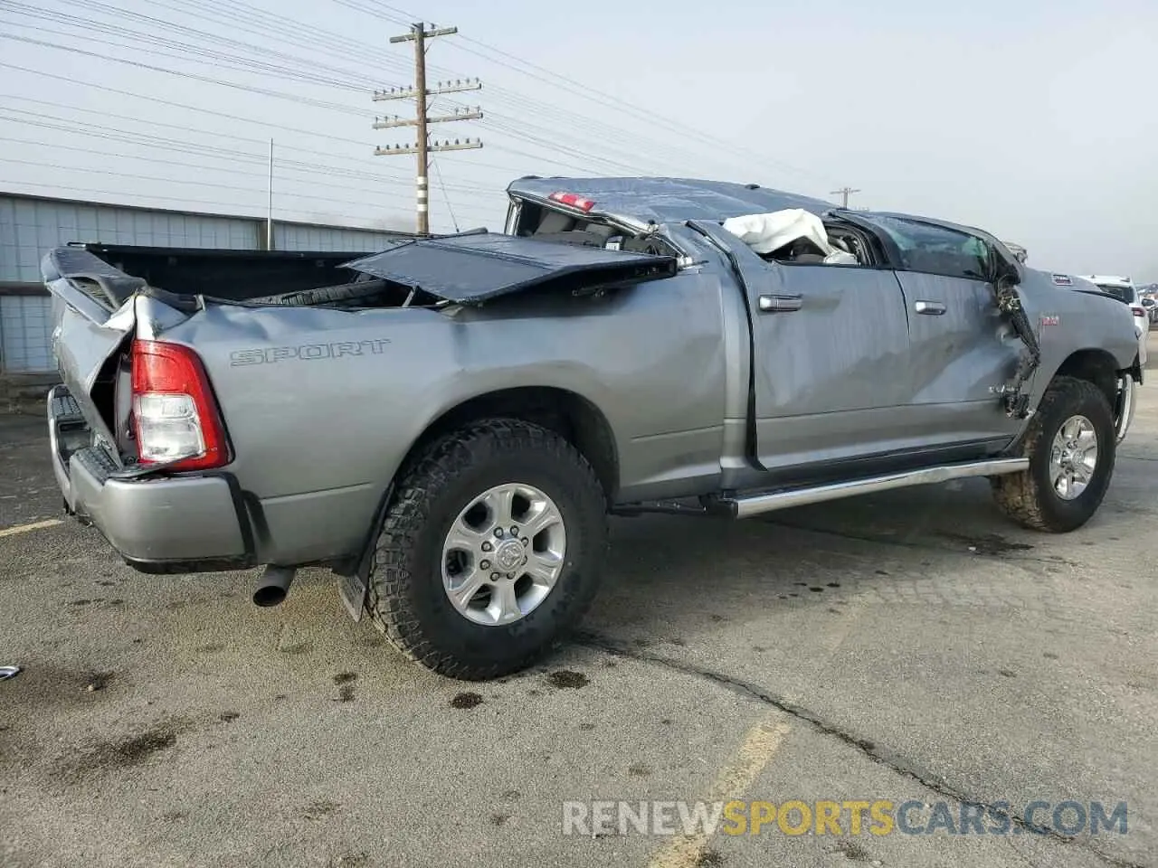 3 fotografías del automóvil dañado 3C6UR5DJ9KG608533 RAM 2500 2019