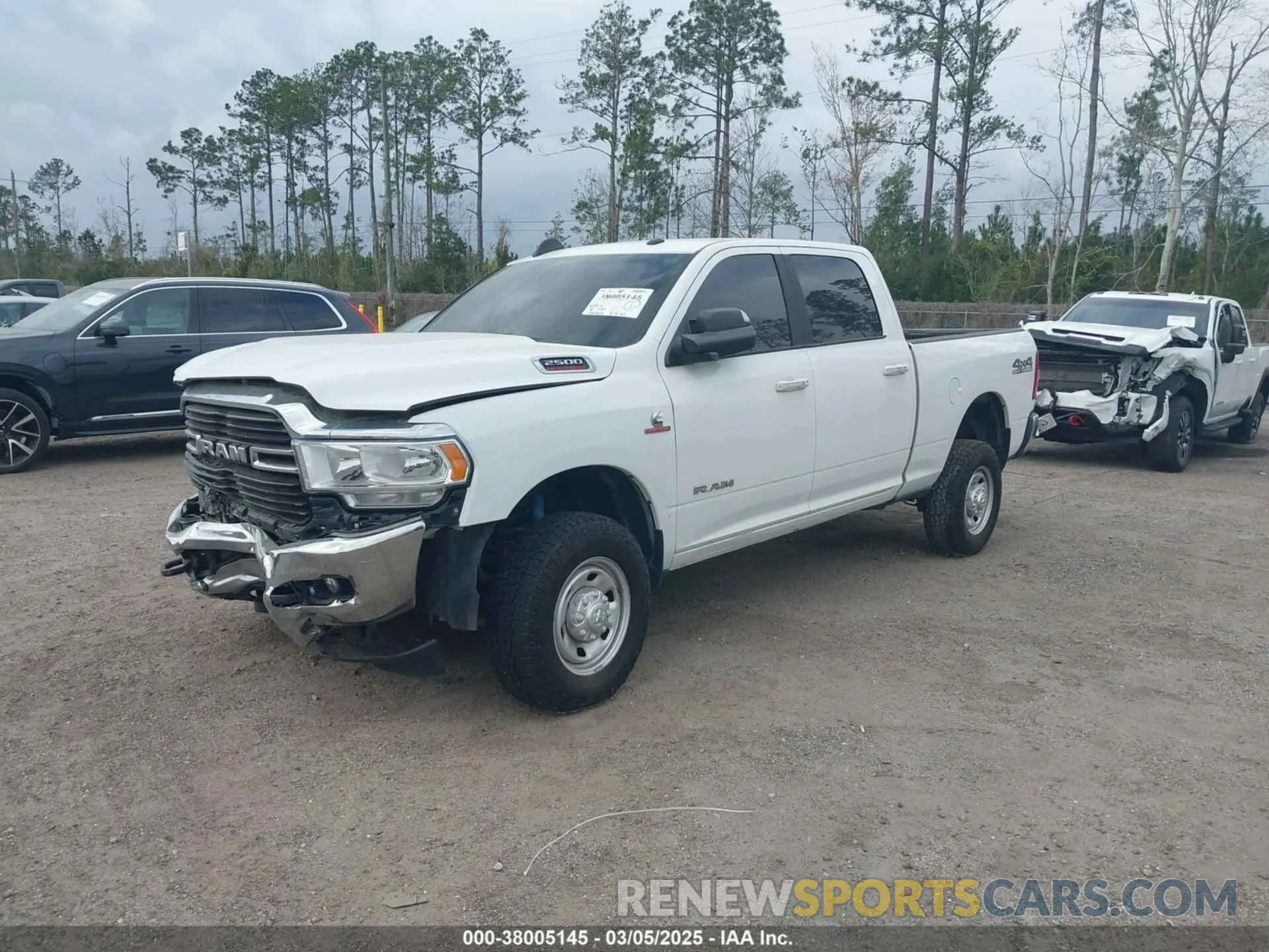 2 fotografías del automóvil dañado 3C6UR5DL0KG598038 RAM 2500 2019