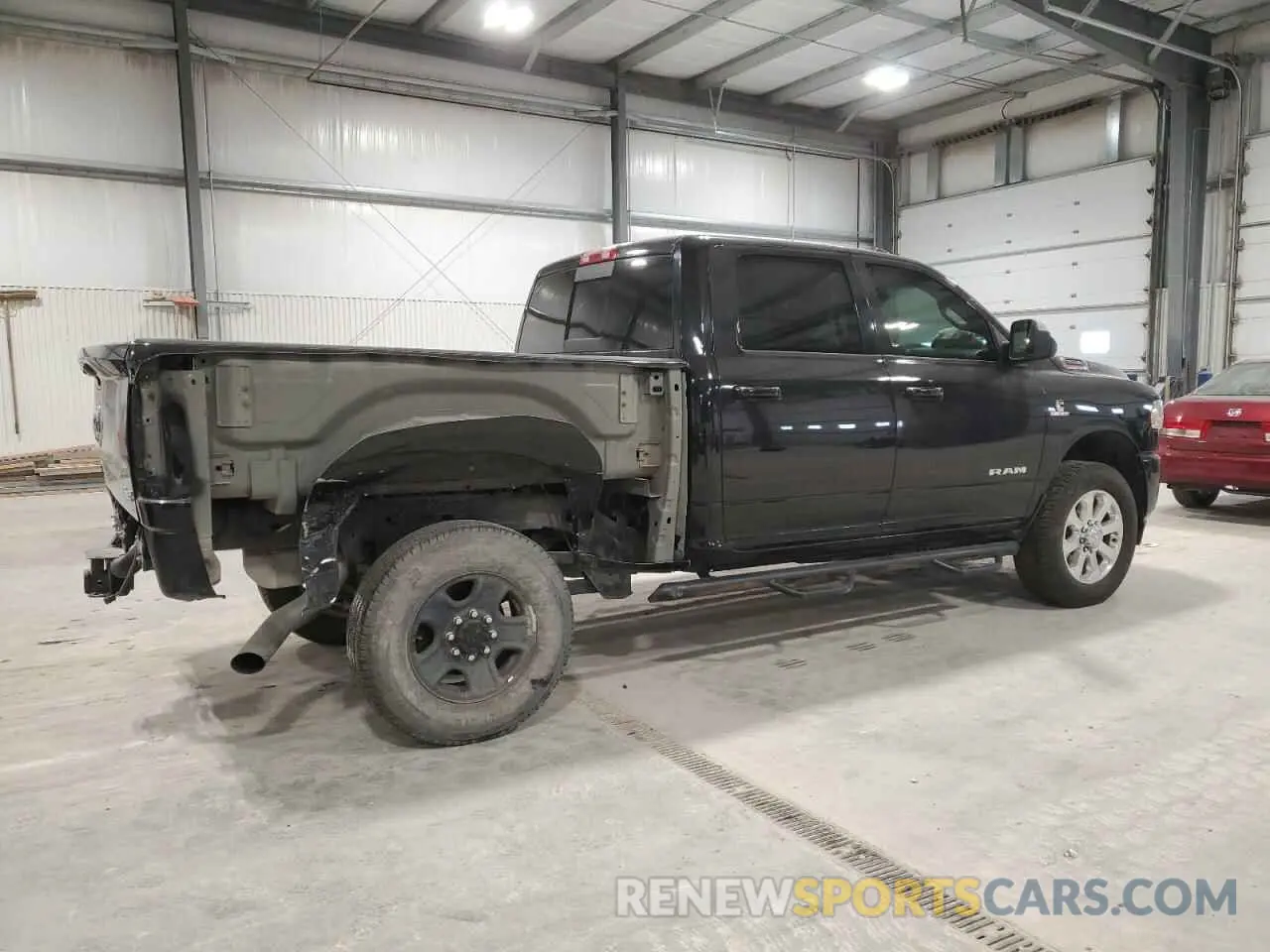 3 fotografías del automóvil dañado 3C6UR5DL3KG559475 RAM 2500 2019