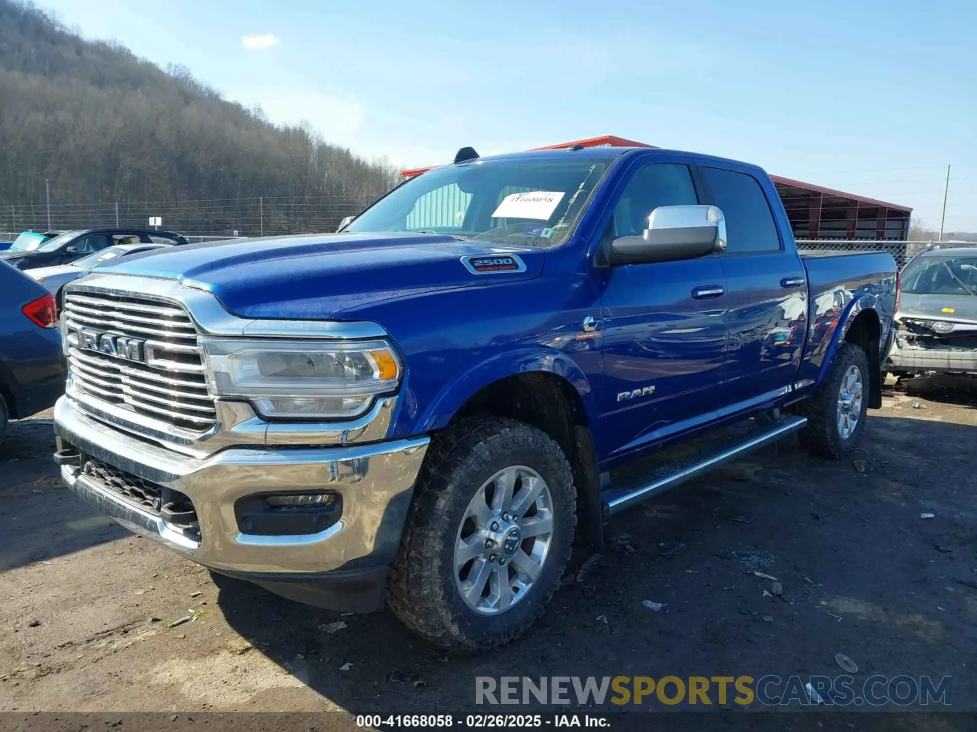 2 fotografías del automóvil dañado 3C6UR5FL1KG640911 RAM 2500 2019
