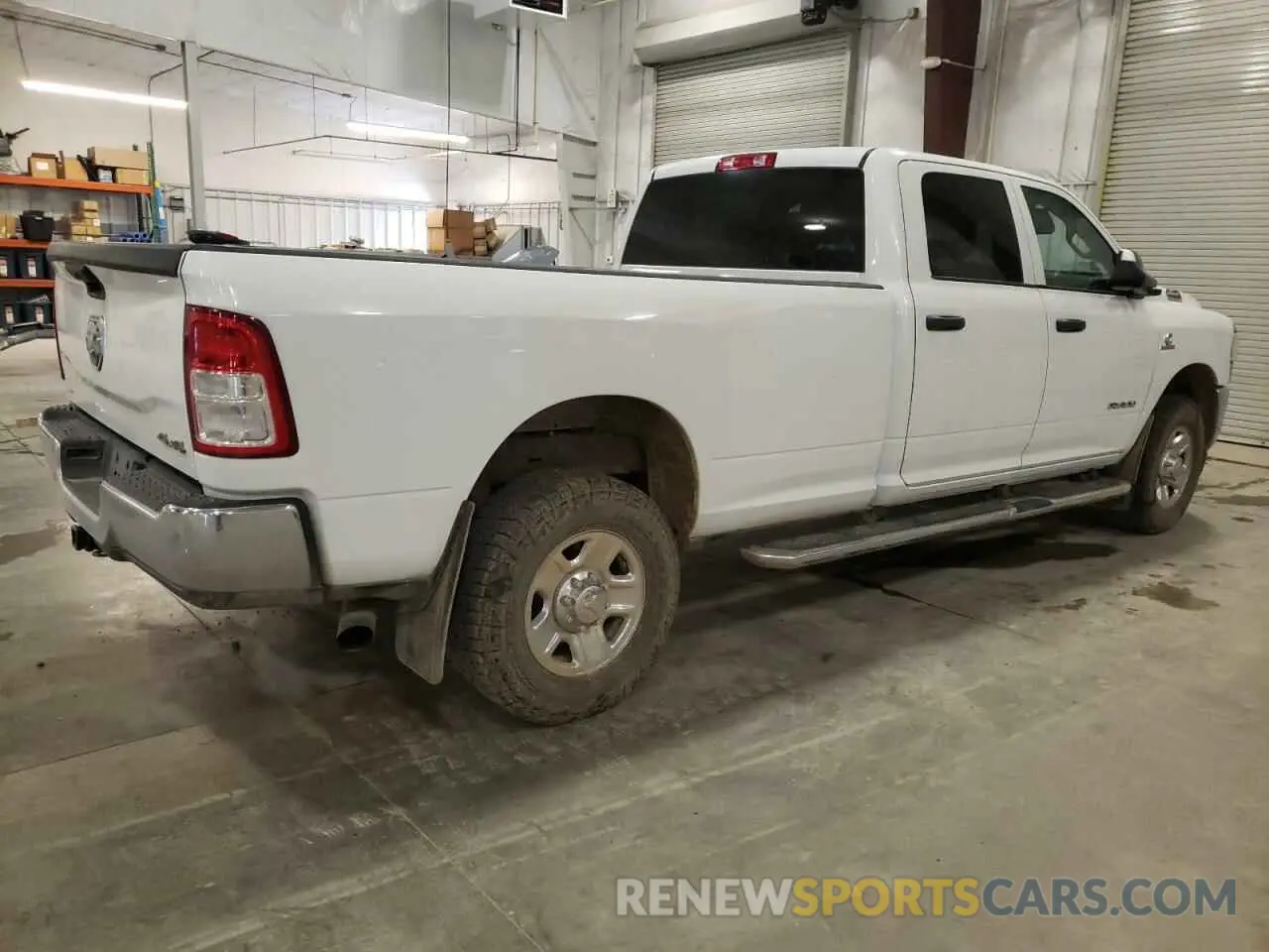 3 fotografías del automóvil dañado 3C6UR5HL6KG601227 RAM 2500 2019